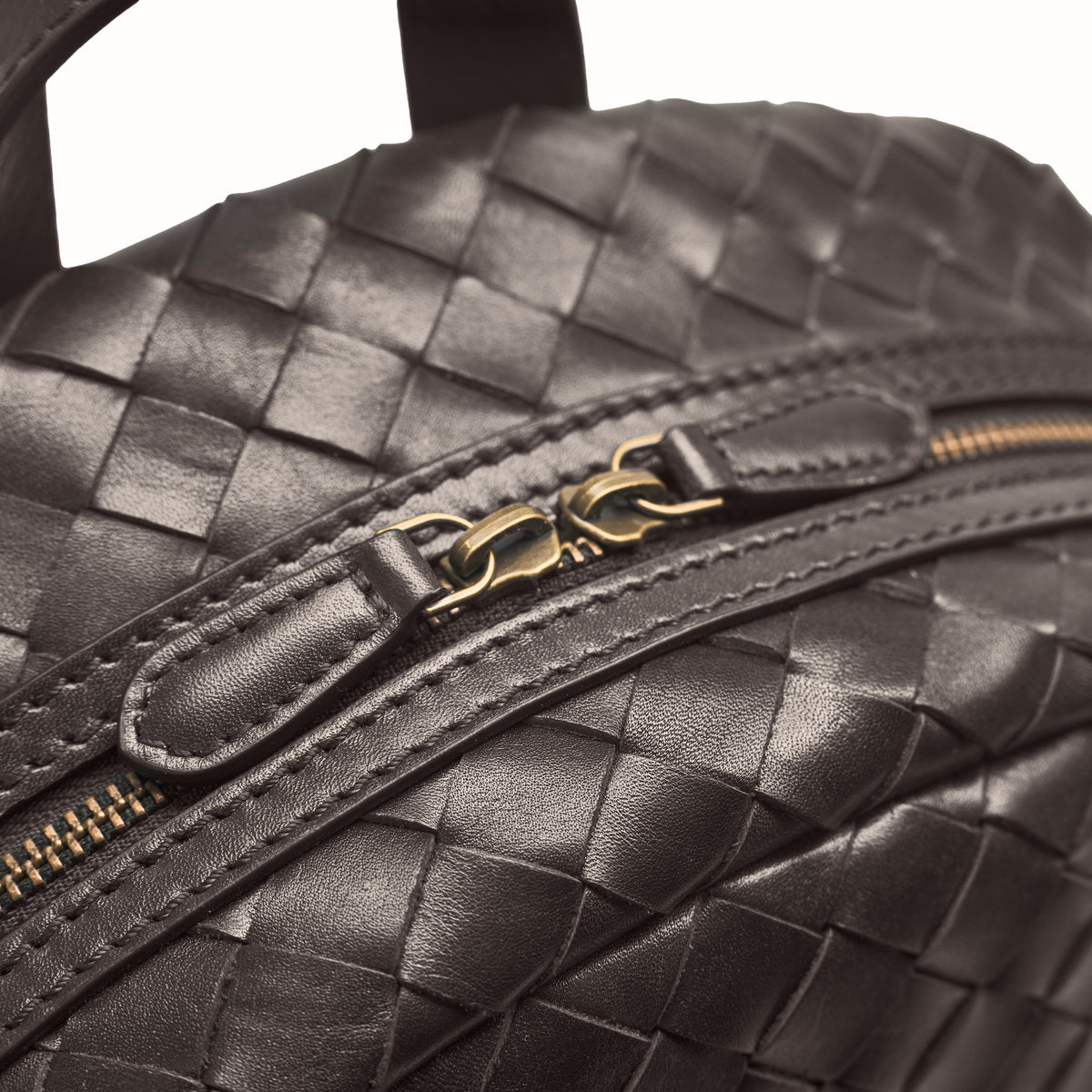 Milan woven leather backpack in Truffle Brown – zip detail
