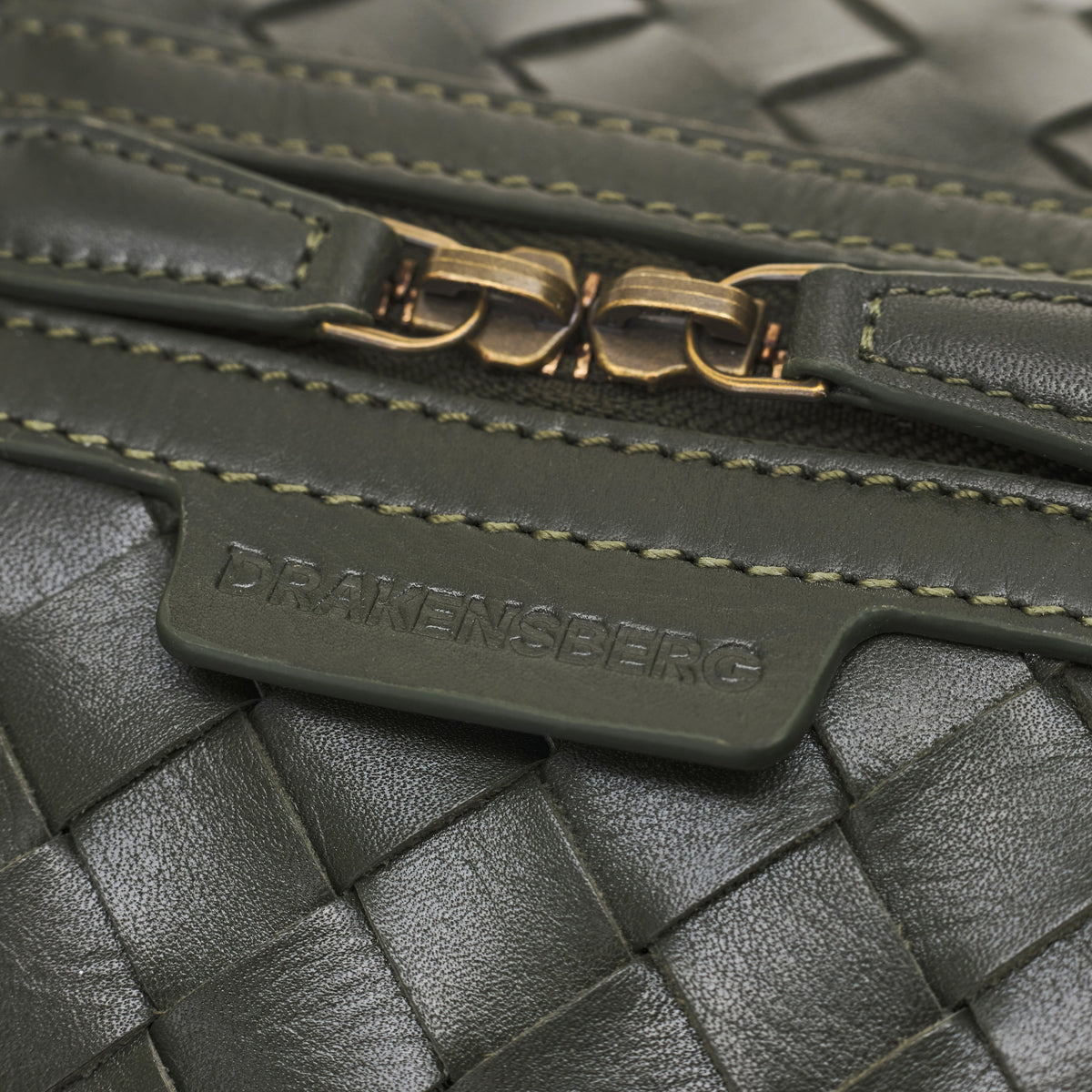 James (50) woven leather weekender in Moss Green with double zip and logo detail