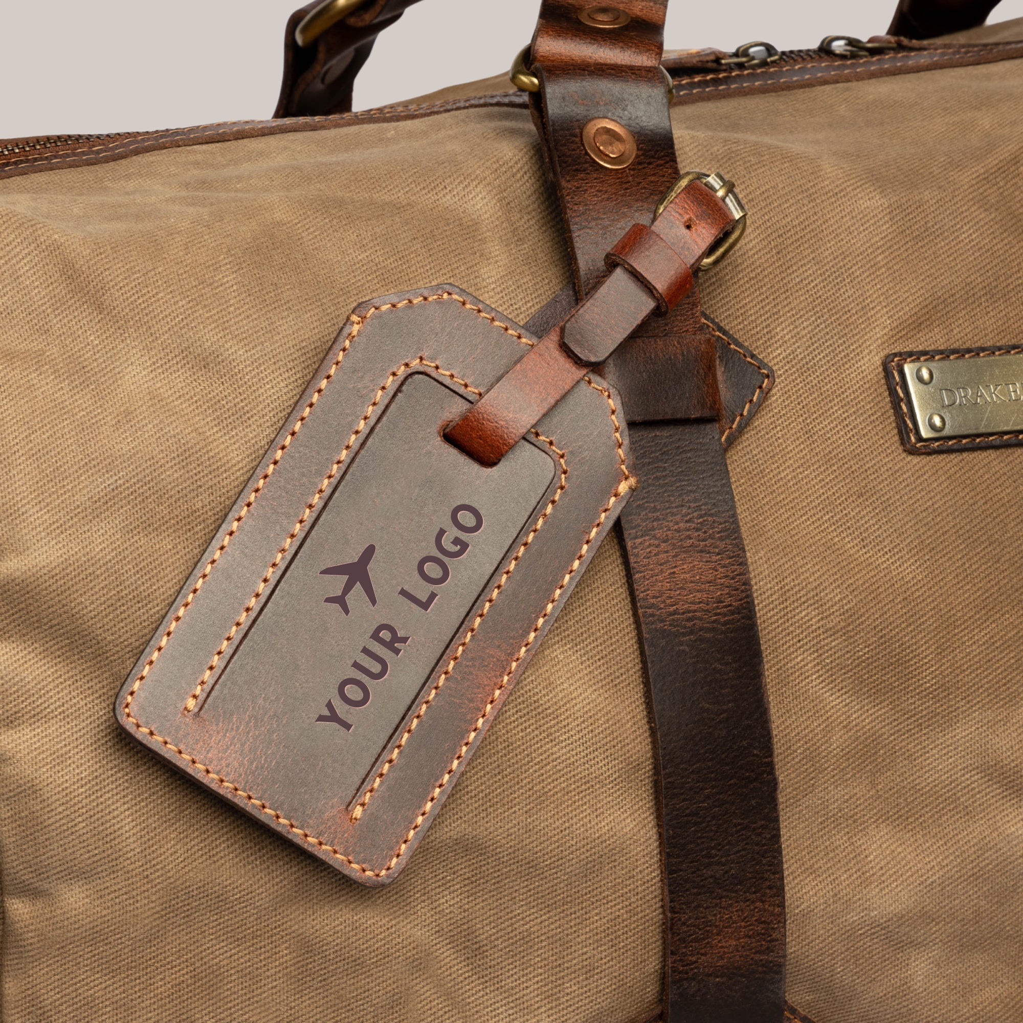 Reisetasche als Werbegeschenk - Beispiel - Muster von einem Logo-Branding auf Gepäckanhänger aus Leder 1-1