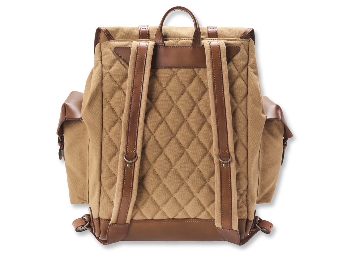 Diamond-quilted back of Henry in Khaki Beige, with padded shoulder straps and leather details.