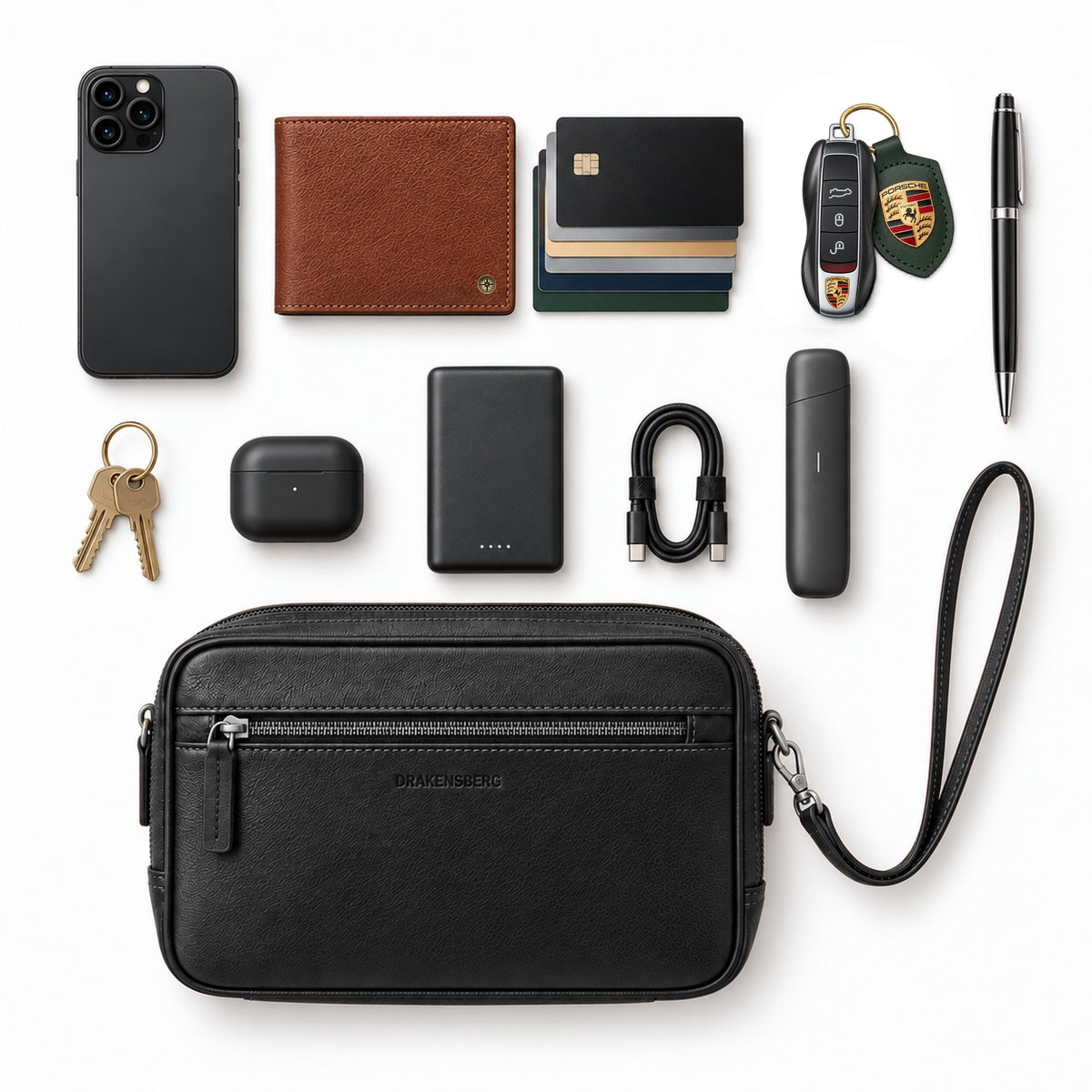 Contents of the Roberto wristlet in Black with travel essentials