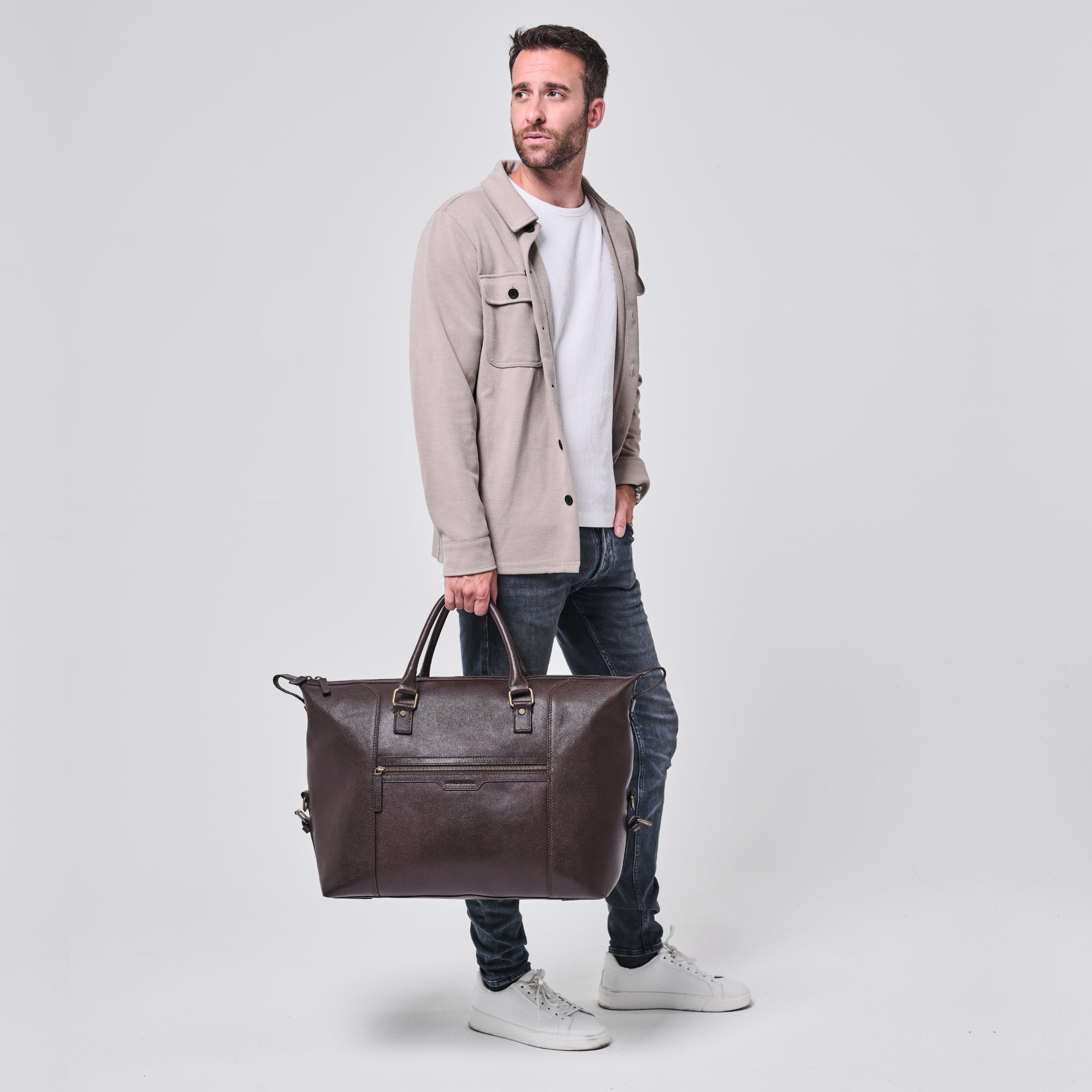 Model carrying Marcello in Chocolate Brown as a generous tote bag