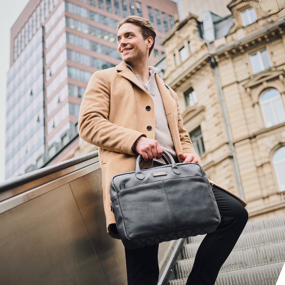 Hugo leather briefcase in Vintage Black – with a man in the city