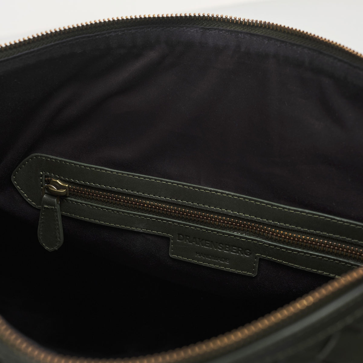 James (50) woven leather weekender in Moss Green with internal zipped pocket