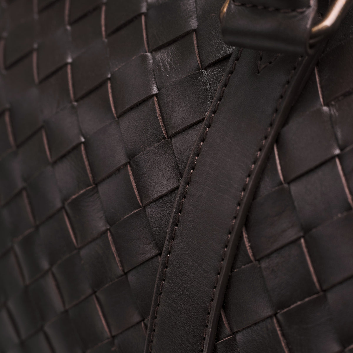 James (50) woven leather weekender in Truffle Brown with leather shoulder strap and woven texture in detail