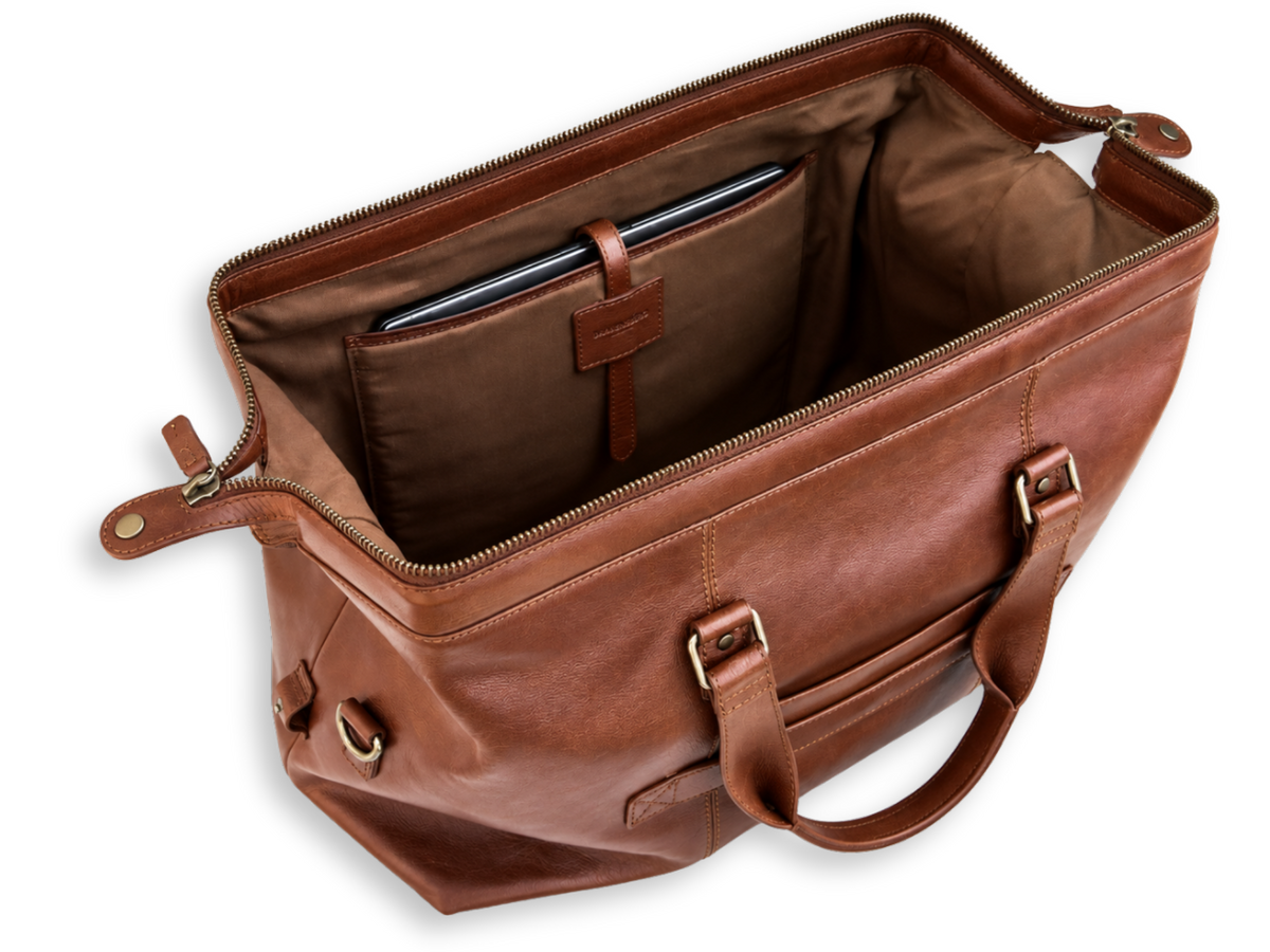 Gepolstertes Laptopfach für Geräte bis 14 Zoll im Inneren der Reisetasche Enzo