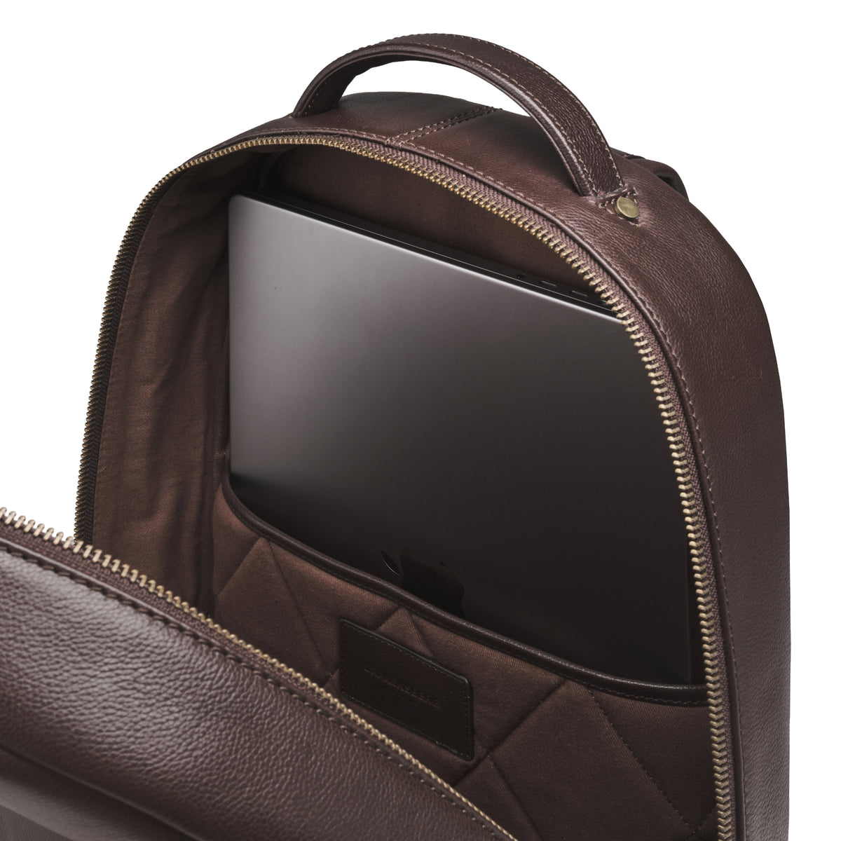 Innenraum des Lederrucksacks Antonio mit gepolstertem Laptopfach