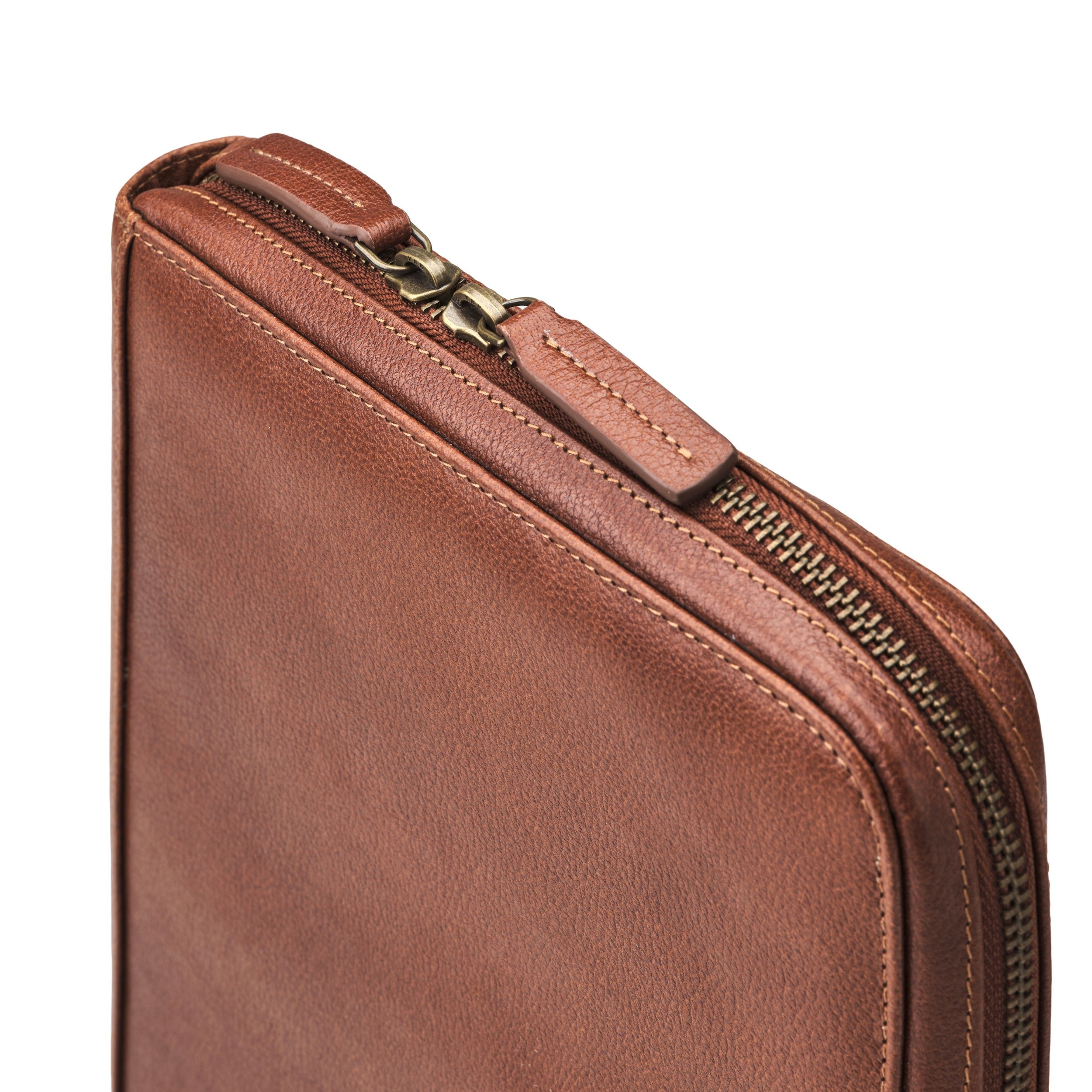 Metal zip and buffalo leather construction of the Nolan tablet bag in Chestnut Brown